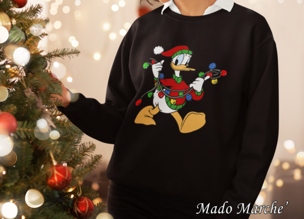 sweatshirt-mockup-featuring-a-woman-standing-by-a-christmas-tree-m30460 (2) Adult Crewneck - Christmas Donald duck - Image 1